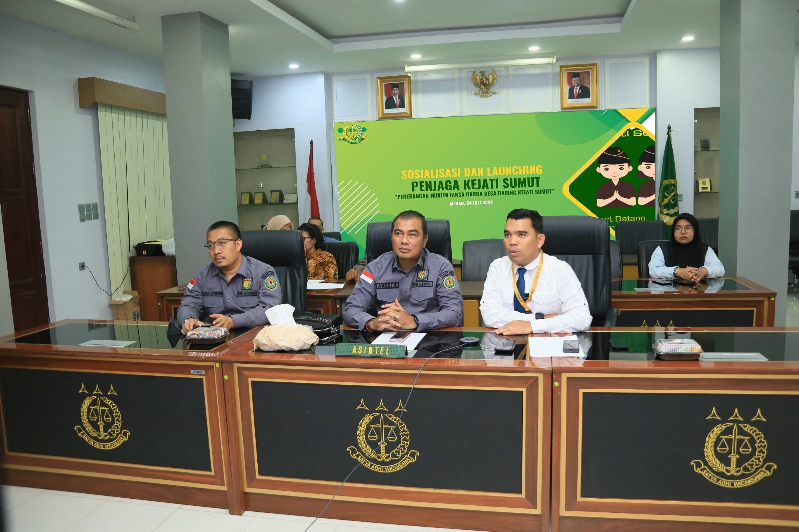 Peluncuran Inovasi Aplikasi Penjaga Kejati Sumut, Kadis PMD dan Ratusan Kepala Desa ikuti melalui Zoom, Deempatbelas.com