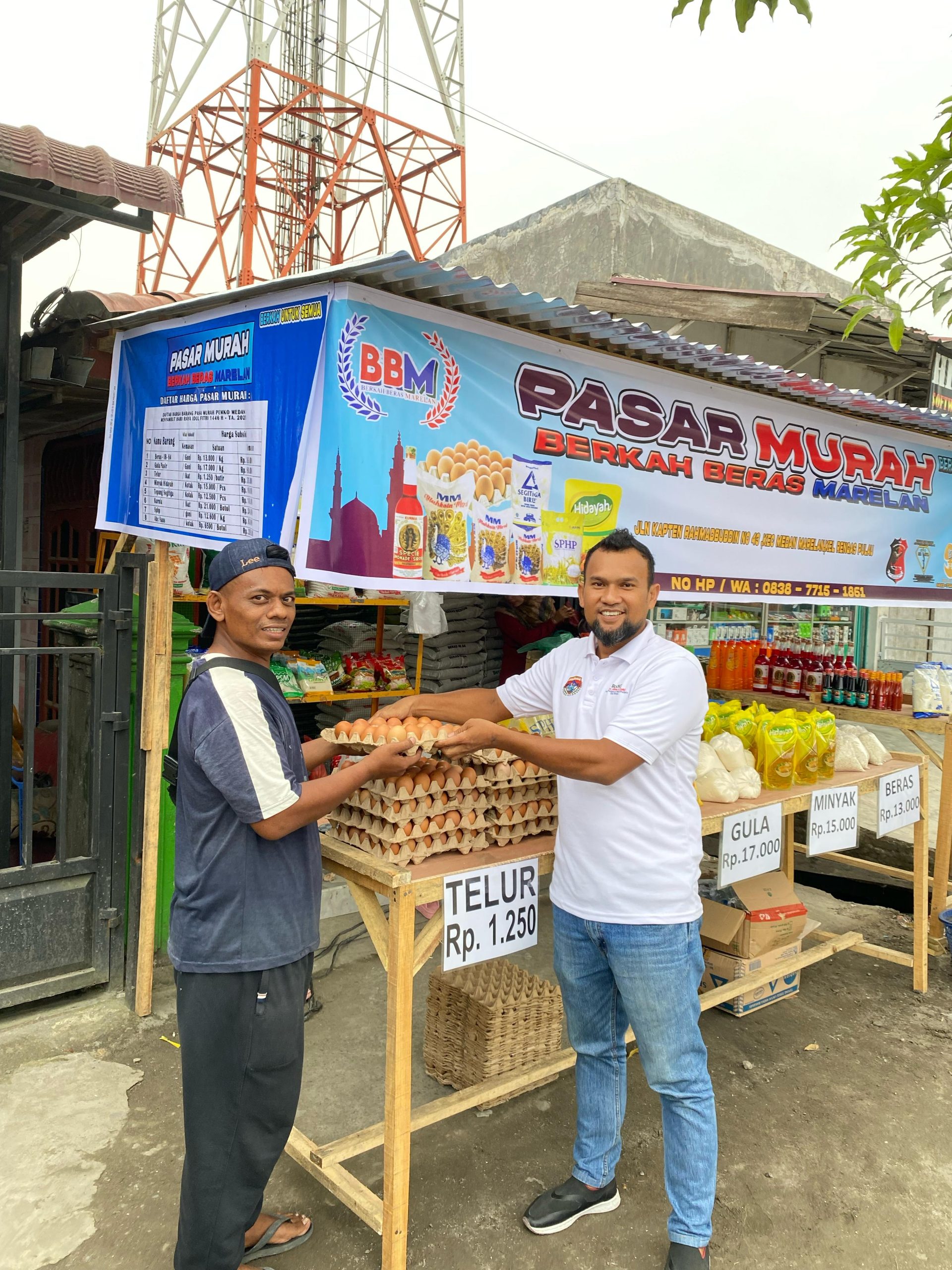 Relawan Rico-Zaky (RANZ) Bagikan Takjil Sekaligus Buka Pasar Murah Ramadhan Bagi Masyarakat di Marelan, Deempatbelas.com